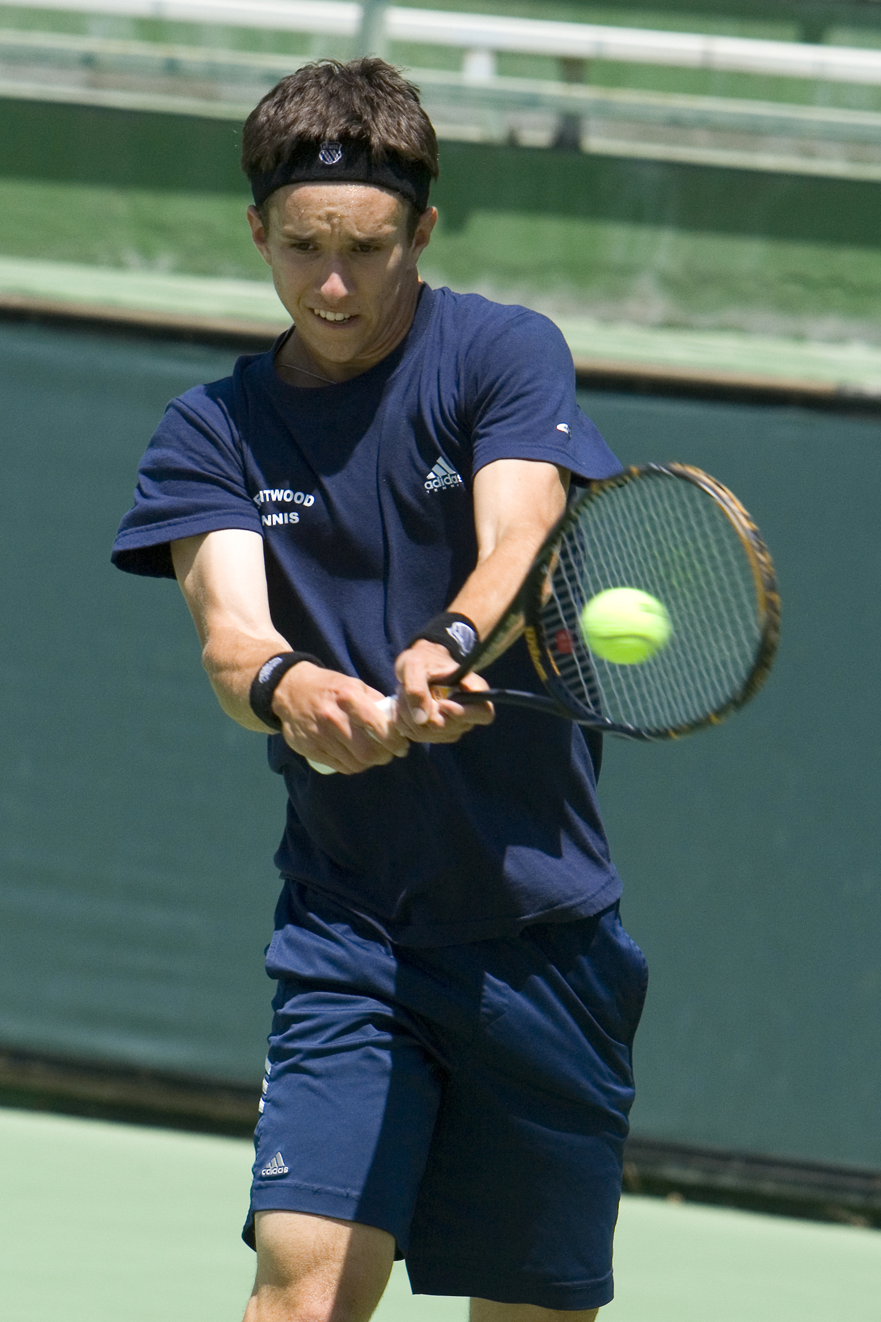 Walker Kehrer smacks a backhand winner during the CIF Division III finals May 28 in Claremont. Photo: Kaye Kittrell